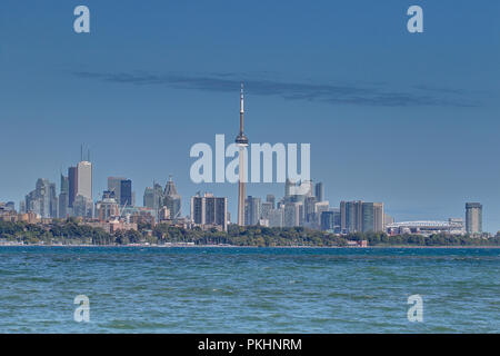 Toronto CN Tower and City Skyline during the summer with a clear blue sky. View across the water of Toronto Ontario Canada. Cityscape with skyscrapers Stock Photo