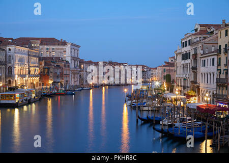 Grand Canal in Venice illuminated in the early morning, clear blue sky in summer in Italy Stock Photo