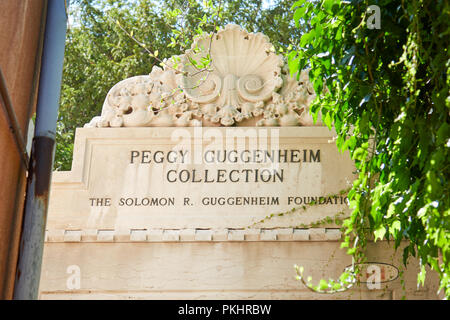 VENICE, ITALY - AUGUST 14, 2017: Peggy Guggenheim Collection museum sign with ivy leaves in Venice in a sunny day, Italy Stock Photo