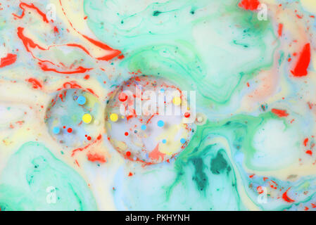 Circles of Water, milk and oil closeup abstract Stock Photo