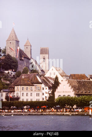 Rapperswil Harbour, Switzerland with buildings of the Einsiedlerhaus and Capuchin Monastery. Original archive photo taken in September 1975. Stock Photo