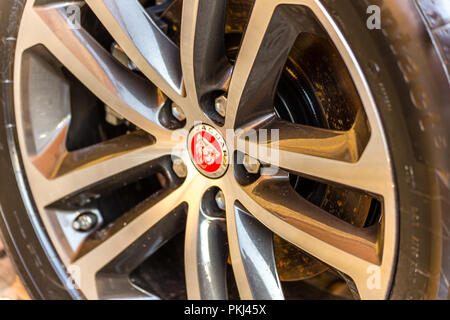 LUGO, ITALY - September 11, 2018:  light enlightening jaguar logo on an alloy wheel Stock Photo