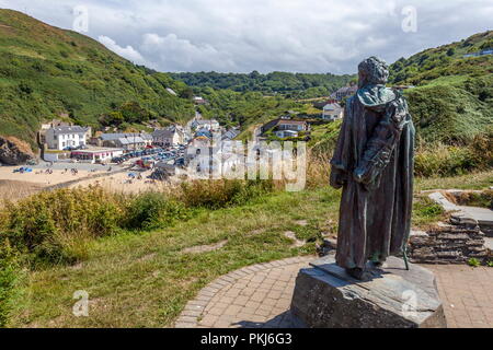 The statue of St Crannog stands overlooking Llangrannog, Ceredigion, wales Stock Photo