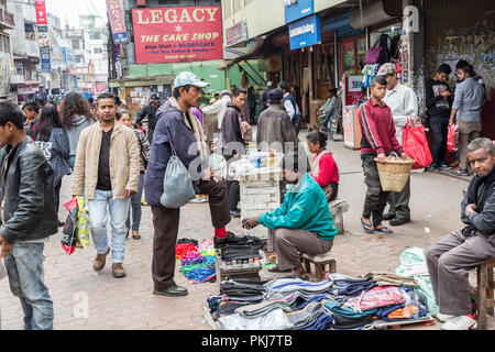 Shoe shine in busy street, Shillong, Meghalaya, India Stock Photo