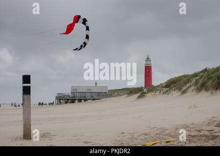 Lighthouse and kite on the sandy beaches of Texel Stock Photo