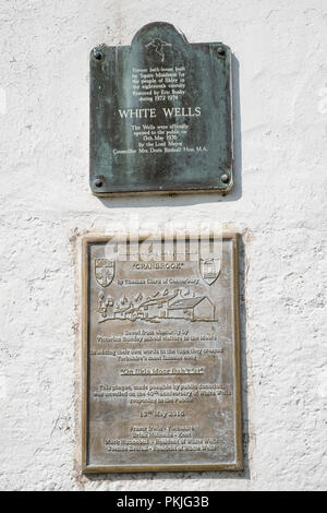 Signs outside White Wells Bathhouse on Ilkley Moor, West Yorkshire, England, UK Stock Photo