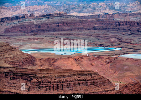 Evaporation pools for mining potash and other salts viewed from Dead Horse Point State Park near Moab, Utah