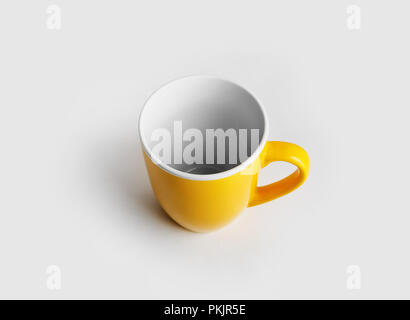 Yellow ceramic cup or mug for coffee or tea. Stock Photo