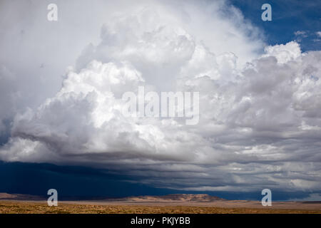 Towering cumulonimbus clouds with a blue sky Stock Photo