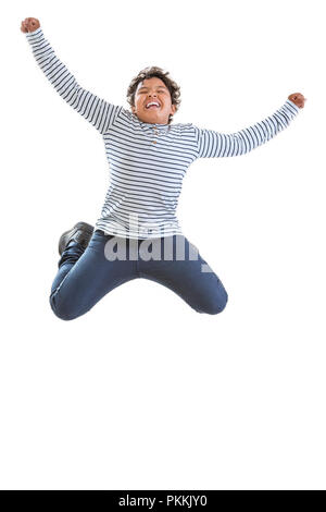 jomping boy. Cheerful young teenager boy jumping for joy. Isolated over white. Stock Photo