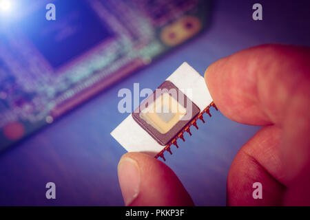 Silicon ceramic chip in the hand Stock Photo