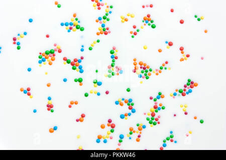 Abstract background from milk white with colored balls Stock Photo