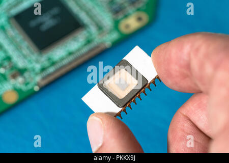 Silicon ceramic chip in the hand Stock Photo