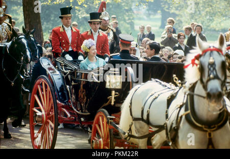 A State Visit in May; 1967; Her Majesty Queen Elizabeth ll, accompanied by her husband, the Duke of Edinbugh (Prince Phillip), rides in an open carriage with King Faisal of Saudi Arabia on the Mall towards Buckingham Palace. They are escorted by guards in ceremonial dress. Stock Photo