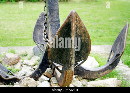 Close-up of weathered historic ship anchors displayed on the Danube riverbank in Bratislava, Slovakia Stock Photo