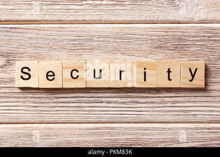 Security word written on wood block. Security text on table, concept. Stock Photo