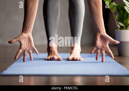 Sporty yogi woman practicing yoga, close up view Stock Photo