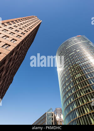 Berlin, Germany - May27, 2017: Office buildings at Potsdamer Platz in Berlin, Germany. Deutsche Bahn sign on glass skyscraper visible at the top right Stock Photo