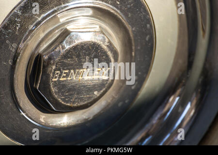 LUGO, ITALY - September 11, 2018:  light enlightening BENTLEY logo on an car wheel Stock Photo