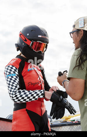 Bonneville, Utah, USA. 13th Sep, 2018. Denise Mueller Korenek attempts to break the Cycling World Land Speed Record; Denise Mueller ready for action talking to mechanic Chris Garcia Credit: Action Plus Sports/Alamy Live News Stock Photo