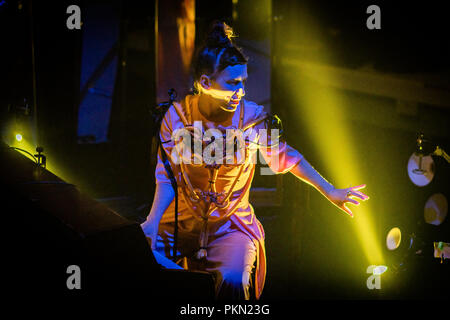 Edinburgh, UK. 14 September 2018. Award-winning singer, songwriter and musician Kathryn Joseph onstage at Summerhall, Edinburgh, performing her latest album ‘From When I Wake The Want Is’. It features the creative team of: Music Producer - Marcus Mackay, Director - Josh Armstrong, Set Designer - James Johnson, Body Architect - Markéta Kratochvílová and Lighting Designer - Nich Smith. The tour was commissioned and produced by Cryptic, presented as part of Glasgow - UNESCO City of Music and developed with support from Paisley Arts Centre & Tramway. Credit: Andy Catlin/Alamy Live News Stock Photo