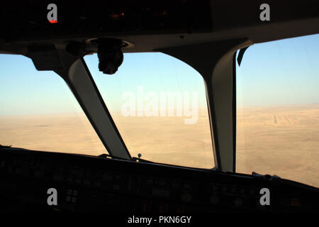 Cockpit View of the approach into Siwa Oasis' Air Force Base in the middle of the Sahara desert in Egypt Stock Photo