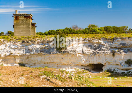 A guard tower and hard labour quarry on Robben Island (Robbeneiland), South Africa, the prison of Nelson Mandela Stock Photo