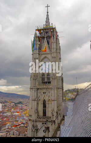 QUITO, ECUADOR - AUGUST 24, 2018: View of the towers of the Basilica in Quito, Ecuador with the city visible in the background Stock Photo