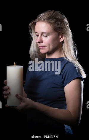 Blonde girl with a thick hair at the beauty salon Stock 