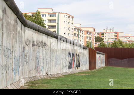 Part of the Berlin wall connecting west and east Germany Stock Photo