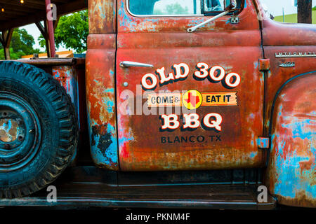 Red truck in Blanco, Texas USA Stock Photo