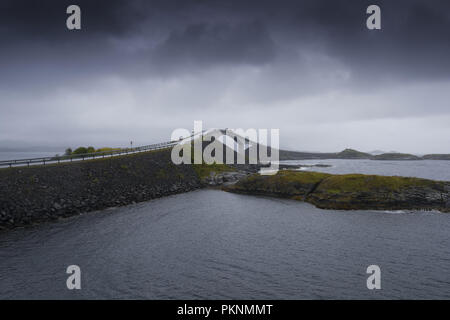 Storseisundet Bridge on a cloudy, rainy day. Atlantic Road, Averoy, Northern Atlantic,  Norway Stock Photo