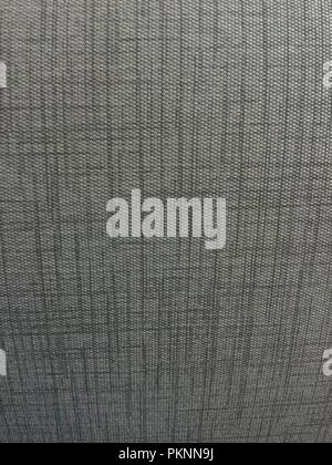 Gray cloth with dark gray design printed on fabric. Stock Photo