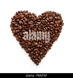 Coffee beans in a heart shape. Stock Photo