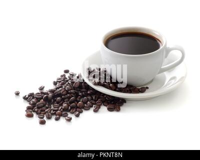 Black coffee in cup with beans. Stock Photo