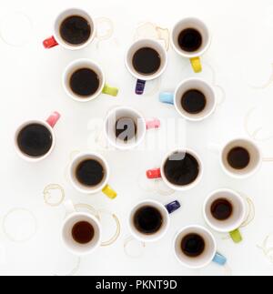 Colourful cups of coffee, high angle view. Stock Photo
