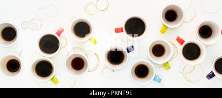 Colourful cups of coffee, high angle view. Stock Photo