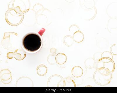 Coffee cup and stains, high angle view. Stock Photo