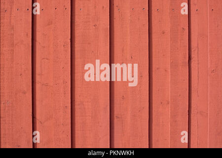 Wood background painted in Falu red color traditional paint in Sweden Stock Photo