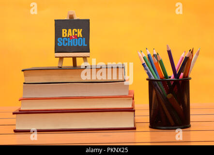 Back to School concept with books and stationery items. Stock Photo