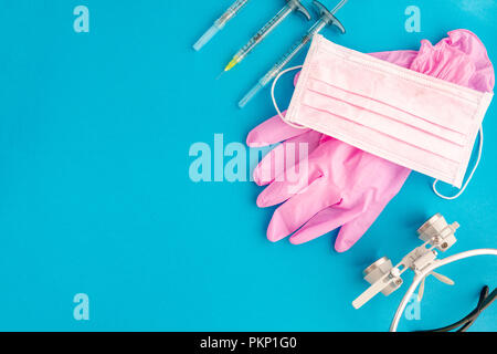 Medical equipments including surgical instruments on a blue background. top view, copy spase Stock Photo