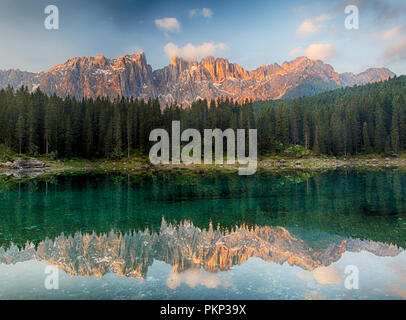 Alps lake landscape with forrest mountain, Lago di Carezza - Dolomites Stock Photo