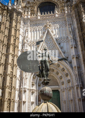Seville, Spain - 19 June 2017: The lady of faith at the gothic church in Seville, Spain, Europe. The Seville Cathedral, also known as Cathedral of Sai Stock Photo