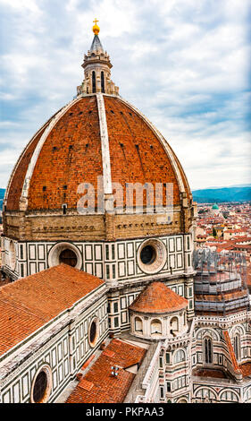 Large Dome Golden Cross Duomo Cathedral Church Florence Italy.  Finished 1400s.  Formal name Cathedral di Santa Maria del Fiore. Stock Photo