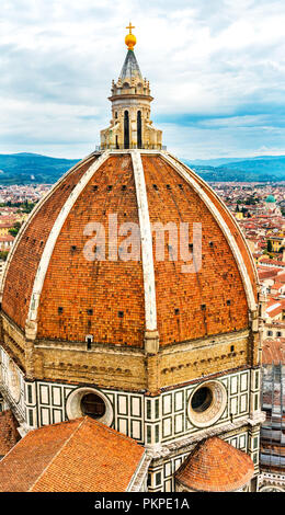 Large Dome Golden Cross Duomo Cathedral Church Florence Italy.  Finished 1400s.  Formal name Cathedral di Santa Maria del Fiore. Stock Photo