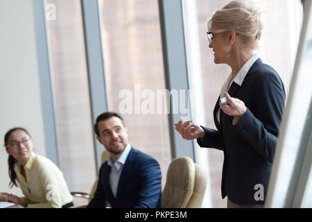 Successful team leader businesswoman boss present new project Stock Photo