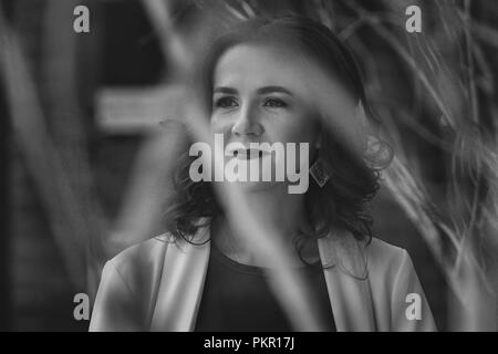 Portrait of a beautiful adult woman close-up. Black and white photo Stock Photo