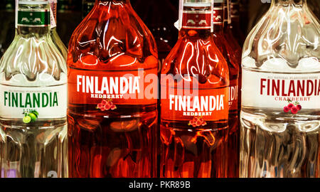 Various Finlandia vodka.  Finlandia is a vodka produced in Finland from Finnish-grown six-row barley and glacial spring water. The barley is distilled into a neutral spirit using a continuous multi-pressure distillation system at a distillery in the village of Koskenkorva operated by Finland’s Altia Corporation. Stock Photo