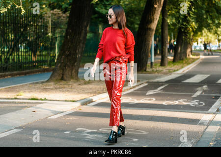 Milan, Italy - September, 22, 2022: Woman Wearing Brown Shiny Leather Long  Sleeves T-shirt, Matching Brown Leather Pants Editorial Stock Image - Image  of moda, accessory: 262227754
