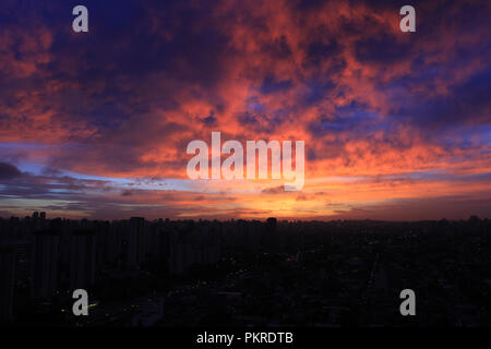 Dramatic sunset like fire in the sky with golden clouds in Gdansk ...